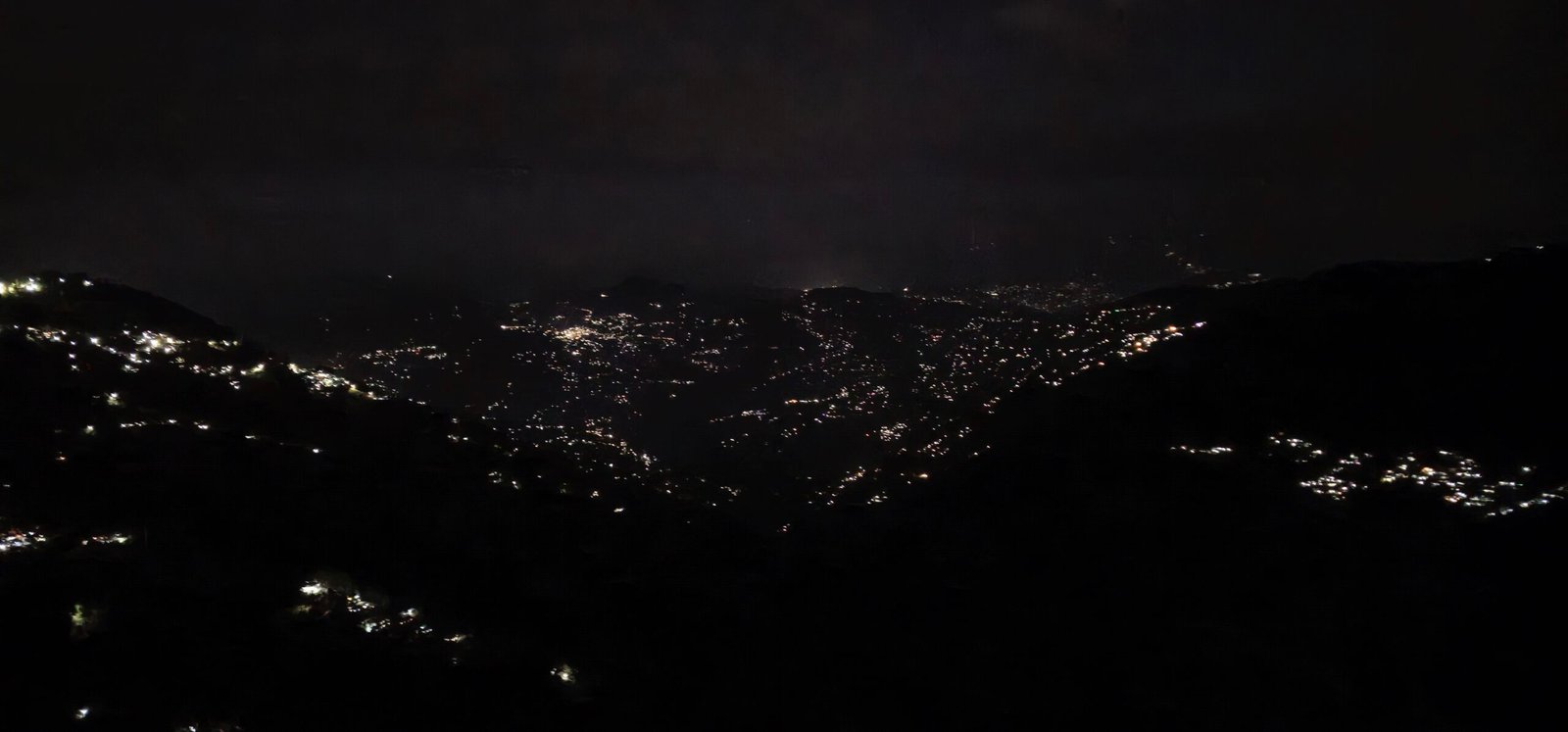Darjeeling night mountain view from luxury hotel near Mall Road