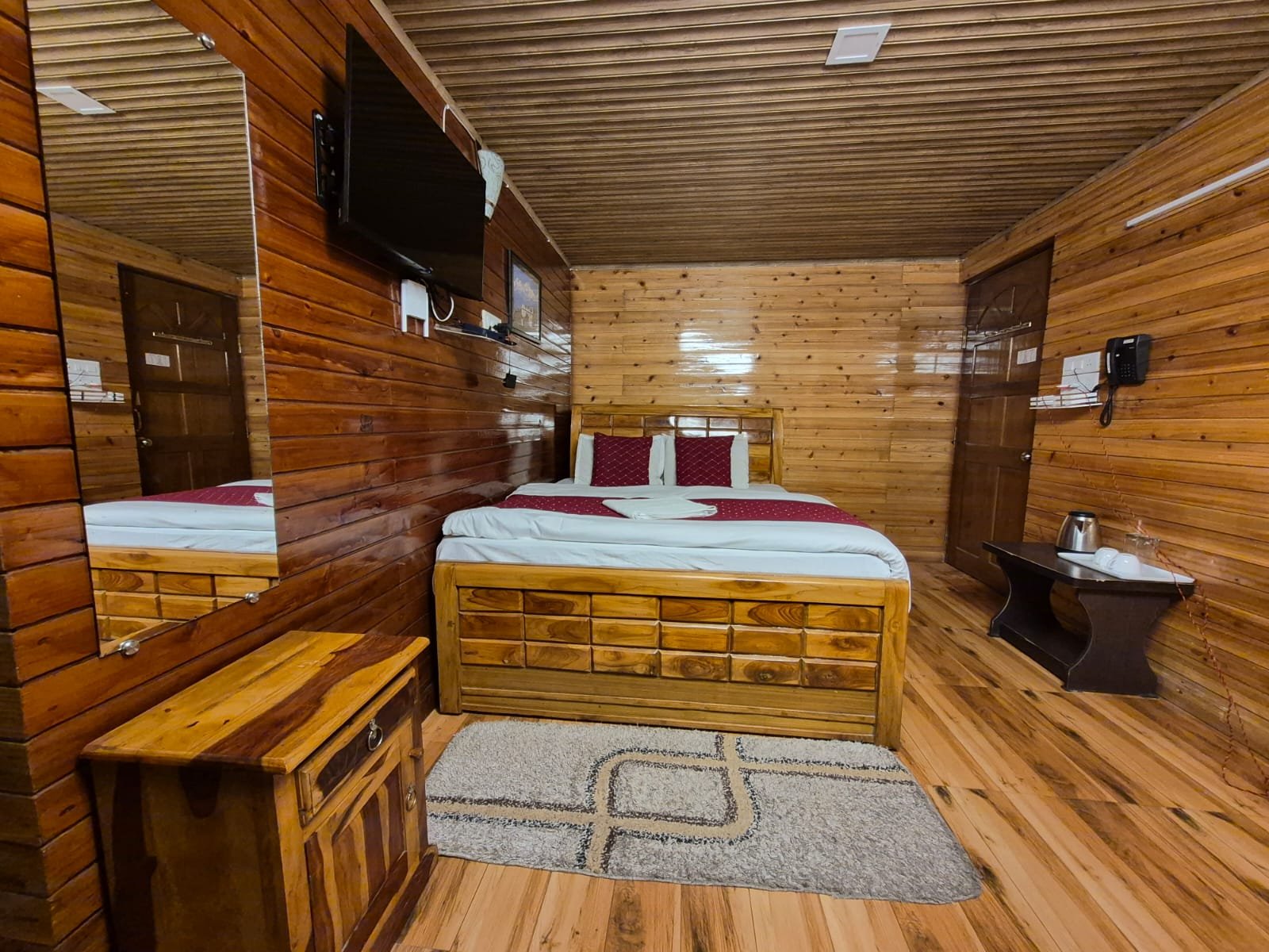 Luxury family suite with wooden interiors in Darjeeling