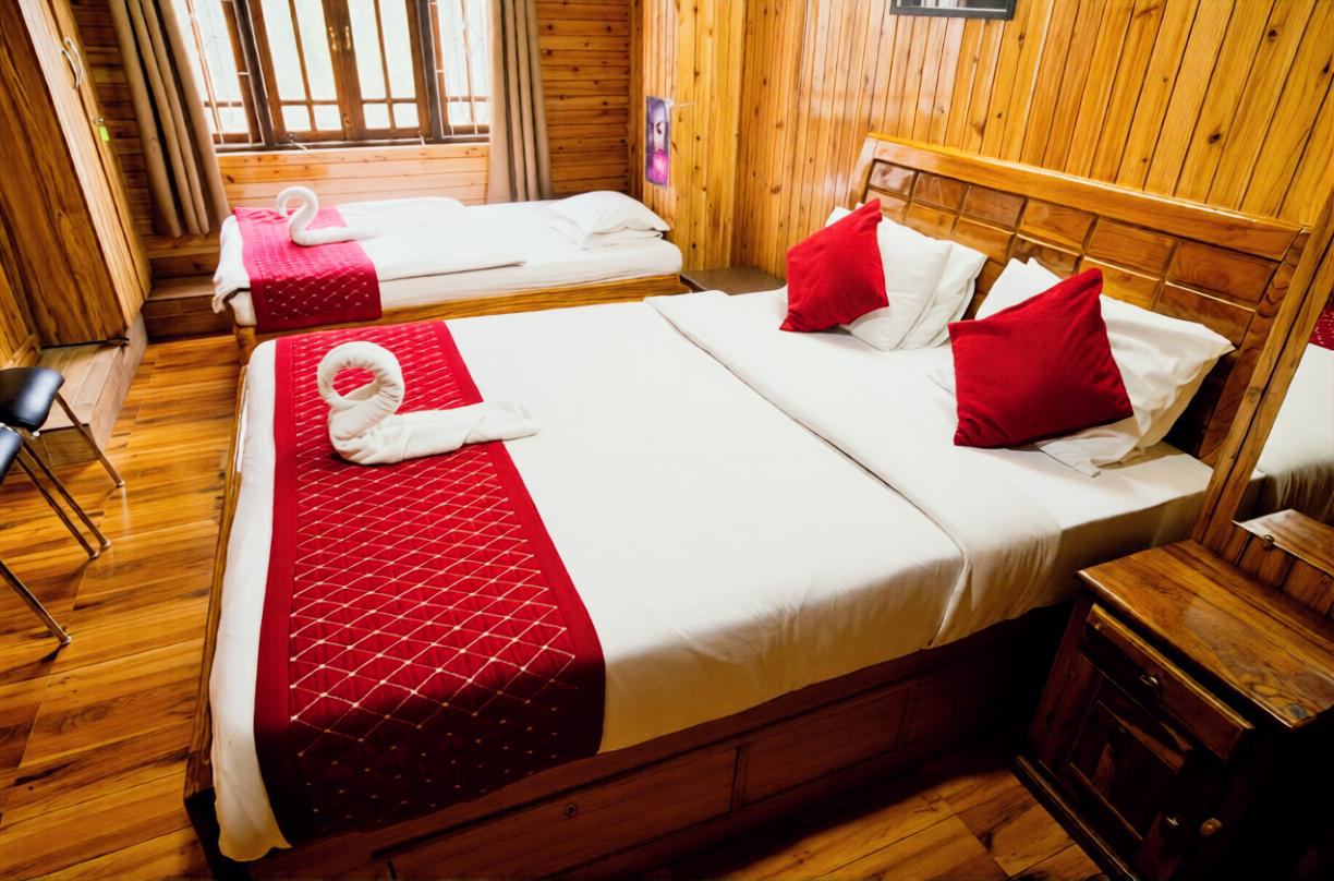 Luxury triple occupancy hotel room with mountain view near Mall Road Darjeeling